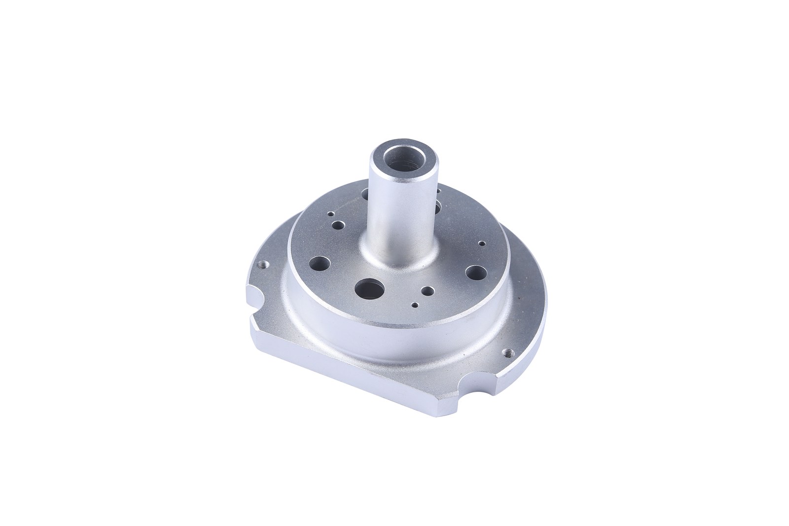 Representative forged and machined metal component showing finished bores, faces, holes and retained near-net geometry Representative forged and machined metal component showing finished bores, faces, holes and retained near-net geometry